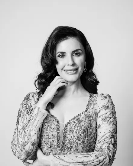 Black and white portrait of a woman in a beaded gown at Contrast Studio Lounge